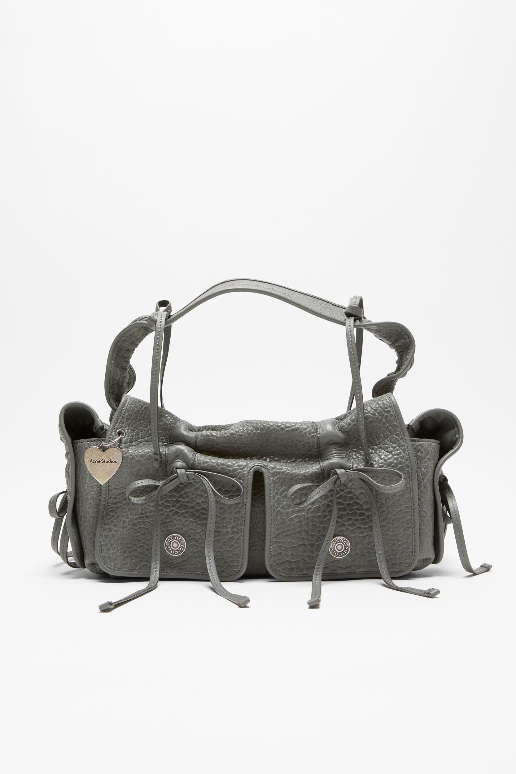Multipocket grained leather bag Product Image