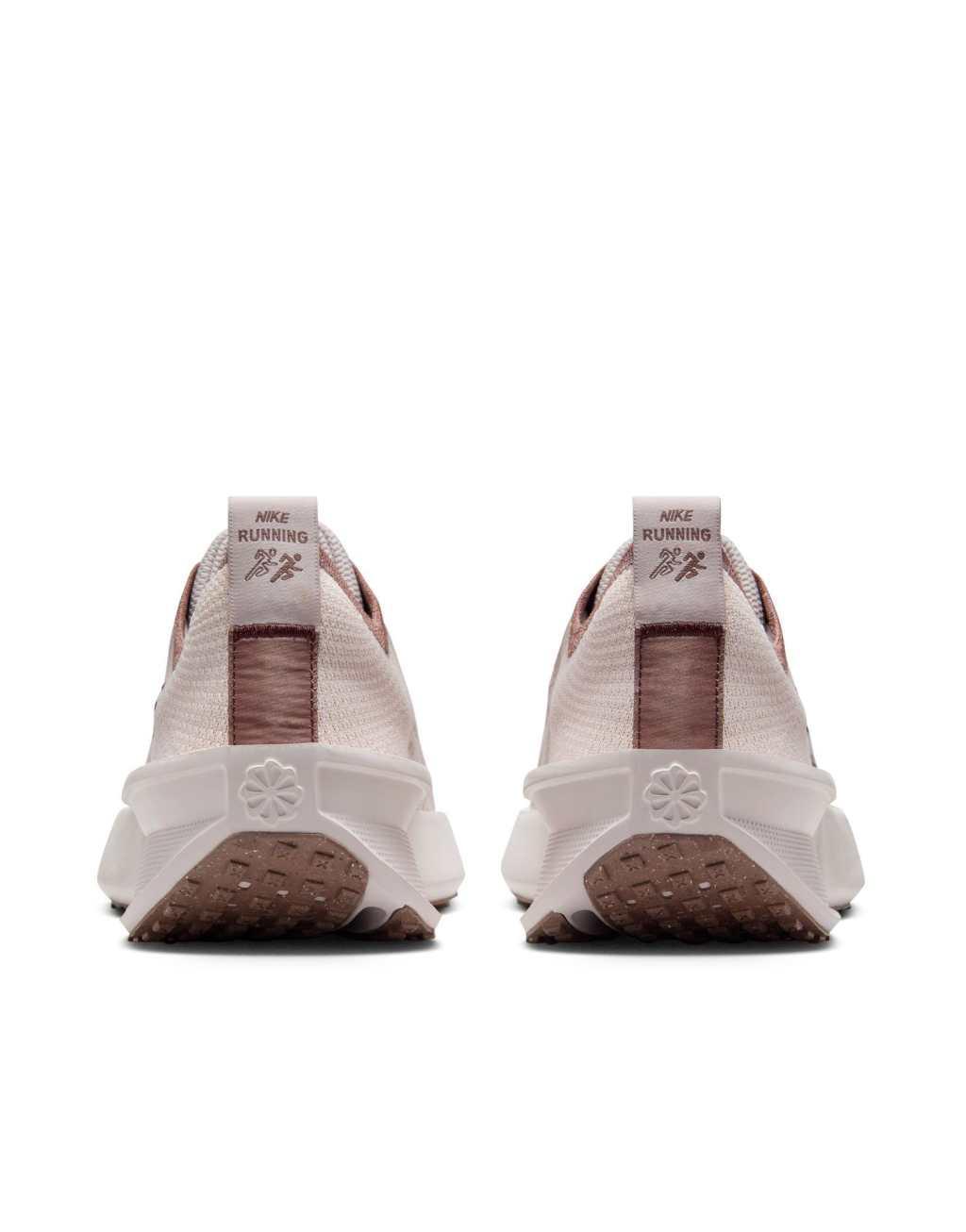 Nike Running React Infinity Run Flyknit sneaker in light pink Product Image