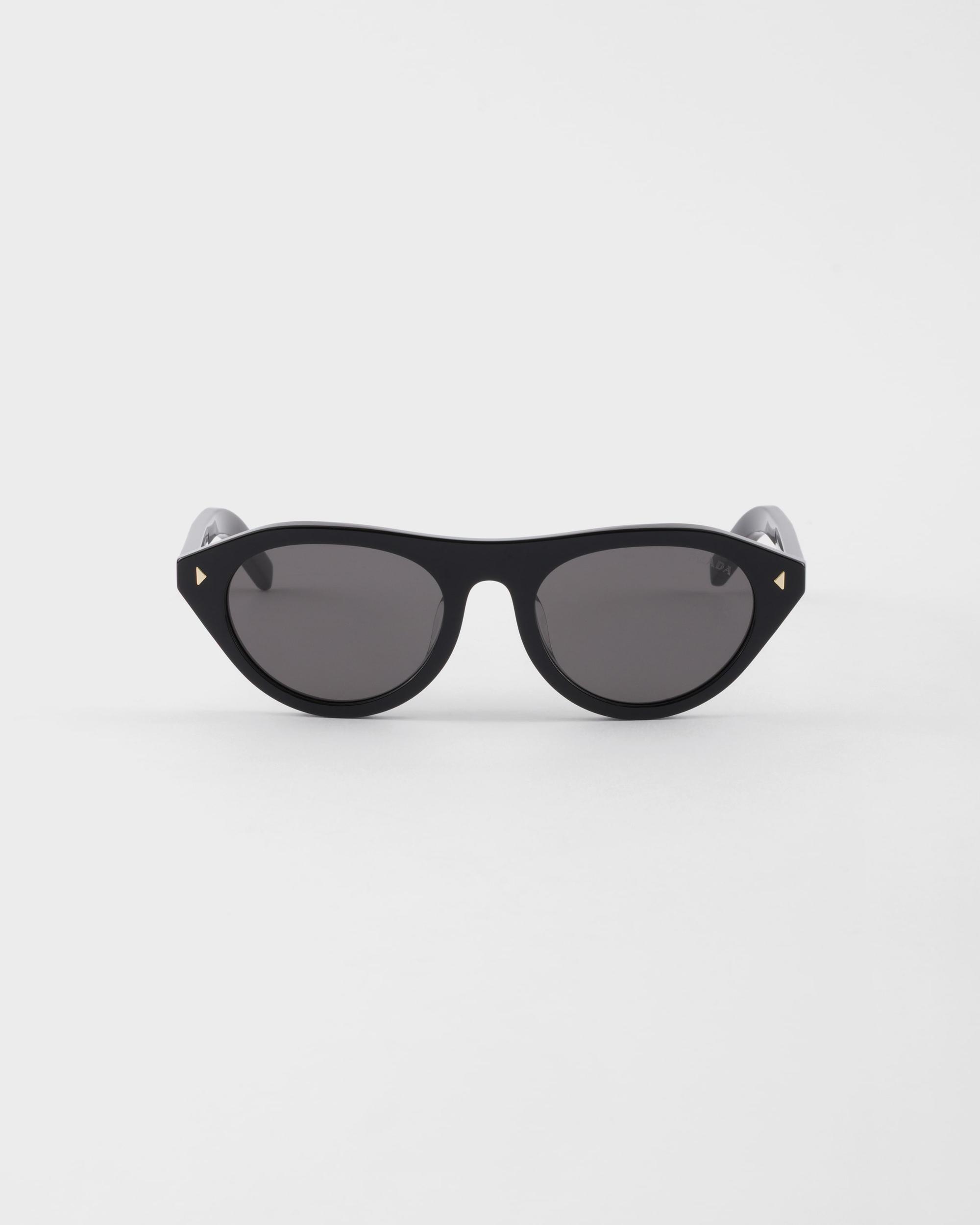 Prada sunglasses with the iconic metal plaque Product Image