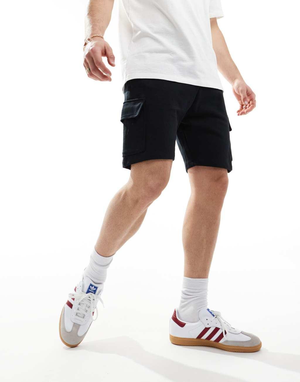 ASOS DESIGN slim shorts with cargo pocket in black Product Image