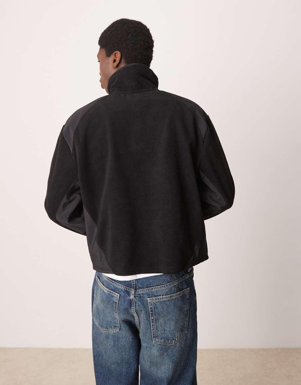 ASOS DESIGN oversized boxy sweater with contrast nylon panels in black fleece Product Image
