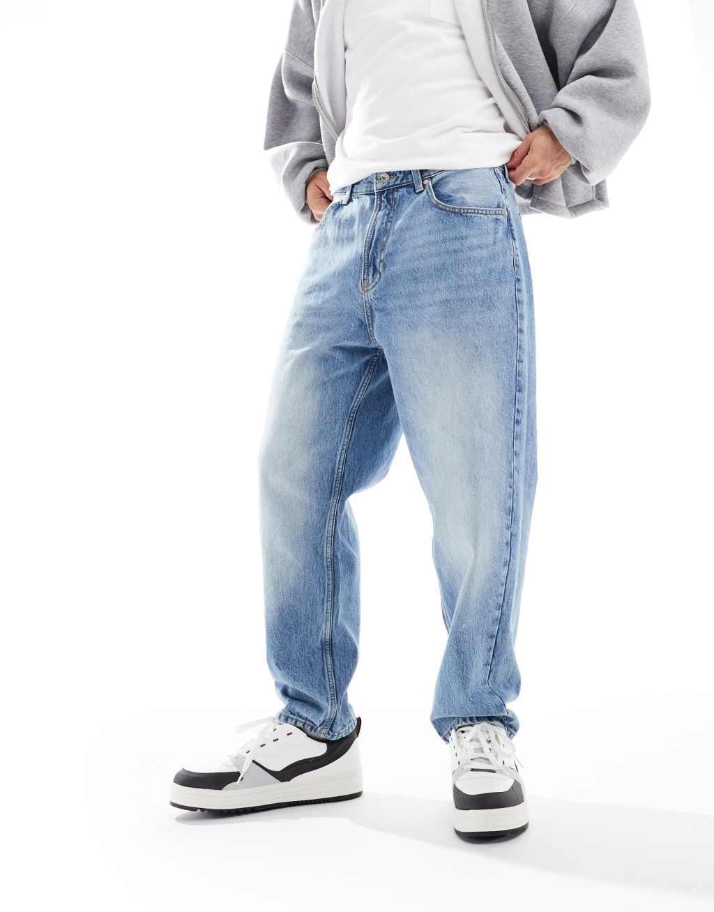 Bershka loose fit jeans in mid wash blue Product Image
