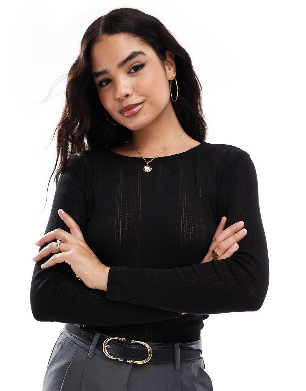 Vero Moda pointelle long sleeve top in black Product Image