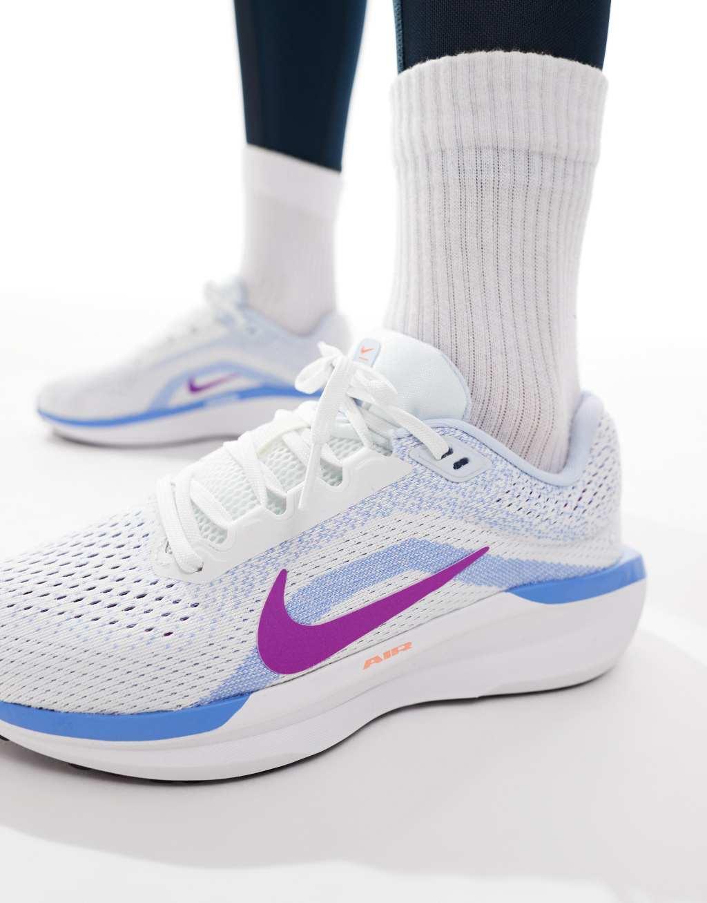 Nike Running Winflo 11 sneakers in white and blue Product Image