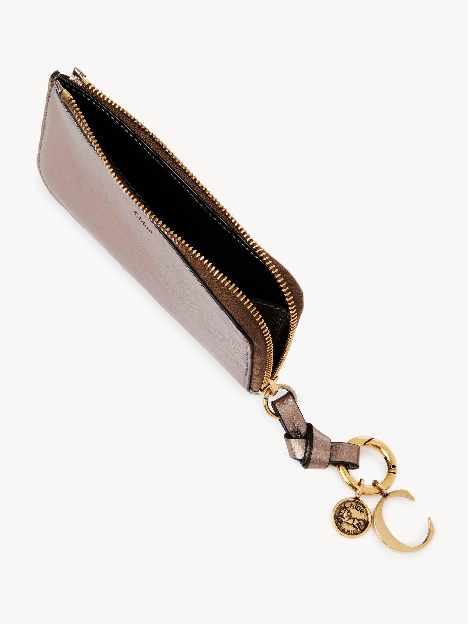 Alphabet wallet in metallized leather Product Image