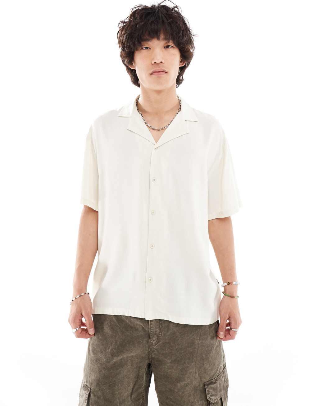 Dr Denim Madi short sleeve relaxed fit summer shirt with world back graphic print in ecru exclusive to ASOS Product Image