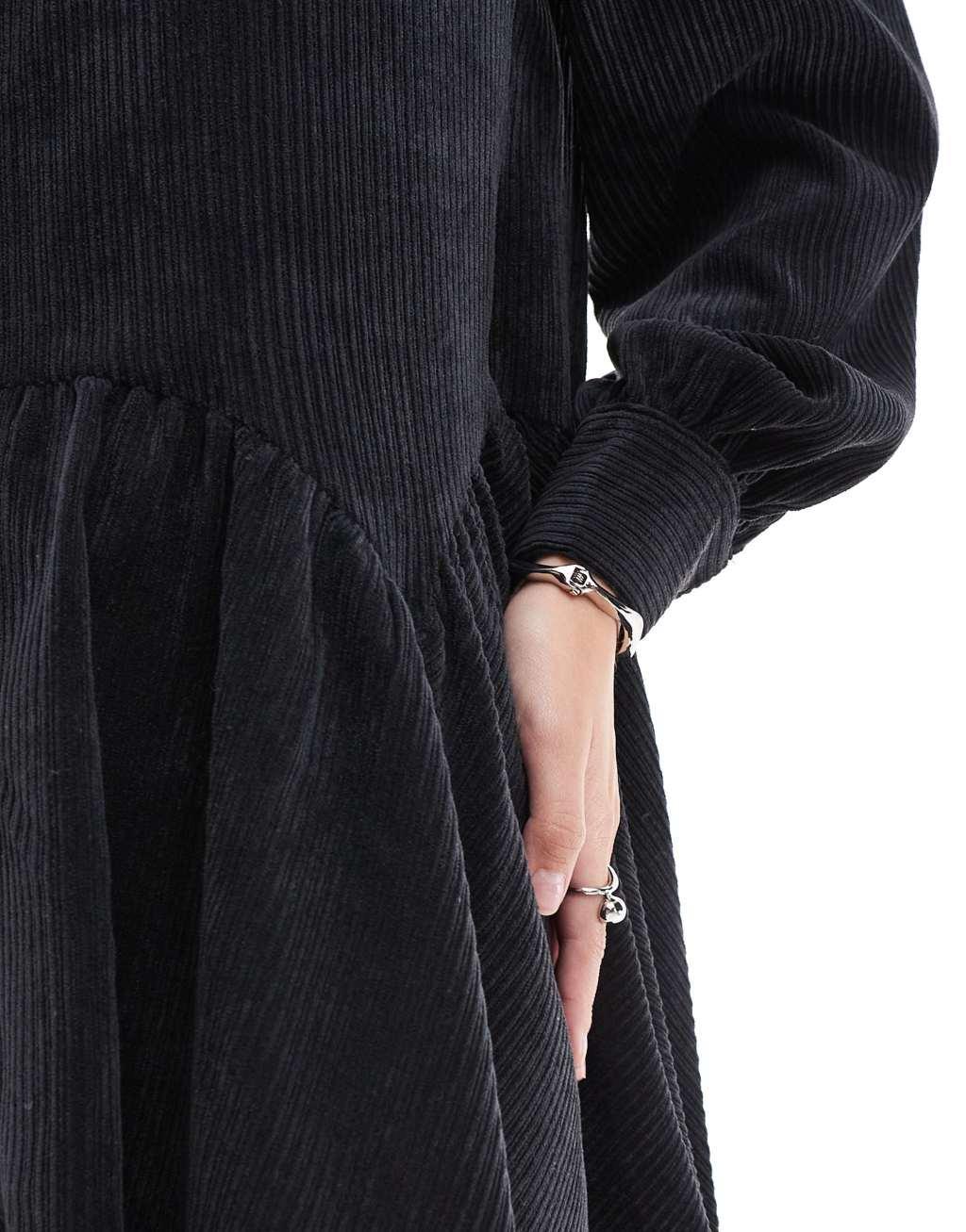 ASOS DESIGN corduroy mini smock dress with peplum hem in black Product Image