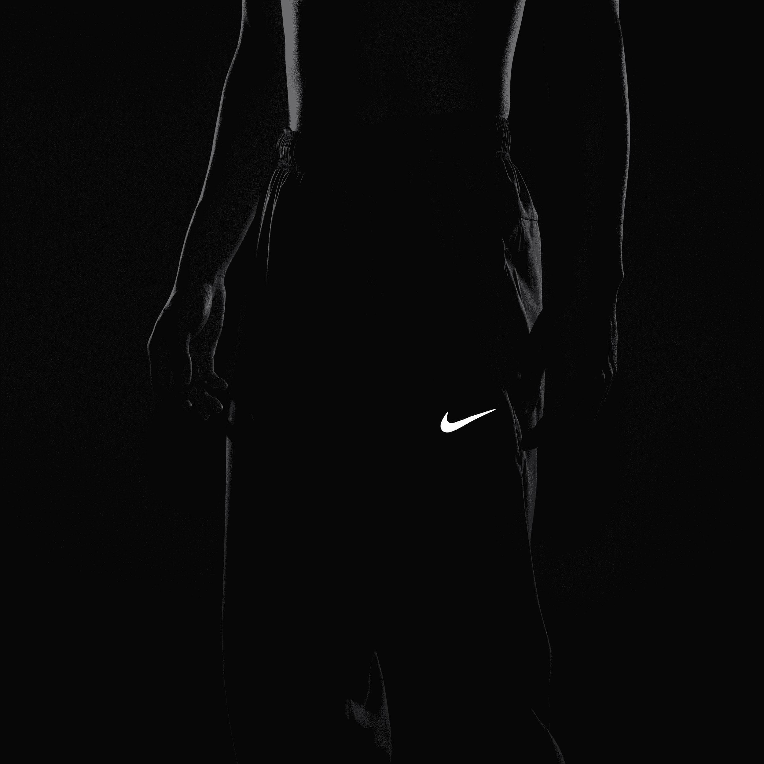 Nike Men's Form Dri-FIT Tapered Versatile Pants in Grey/Smoke Grey Size Large 100% Polyester Product Image