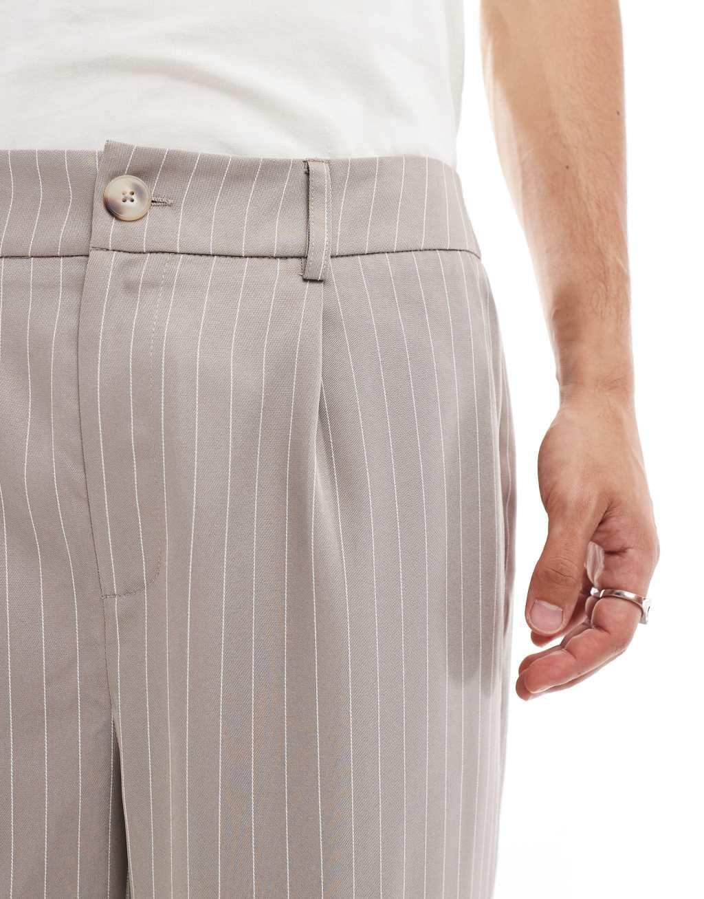 Reclaimed Vintage baggy tailored pants in beige pinstripe  Product Image