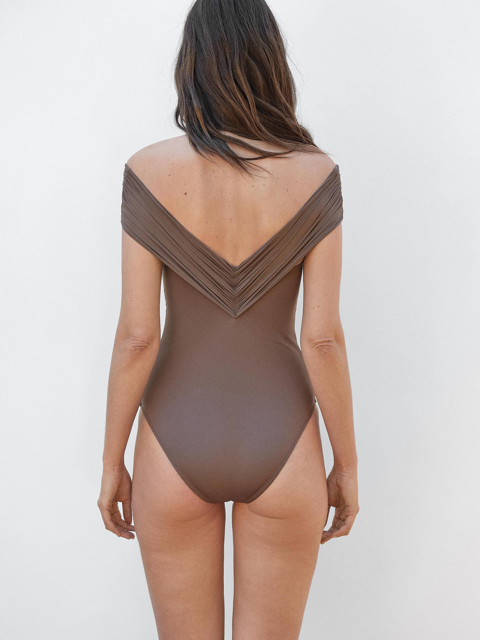 Bandeau swimsuit with criss-cross straps Product Image