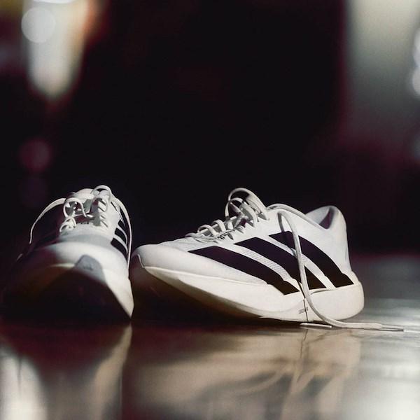 Womens adidas Adizero EVO SL Athletic Shoe - Wonder White / Cyber Metallic / Warm Vanilla Product Image