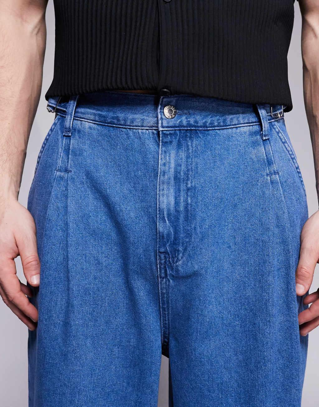 ASOS DESIGN oversized baggy jeans with side belts in mid wash blue Product Image