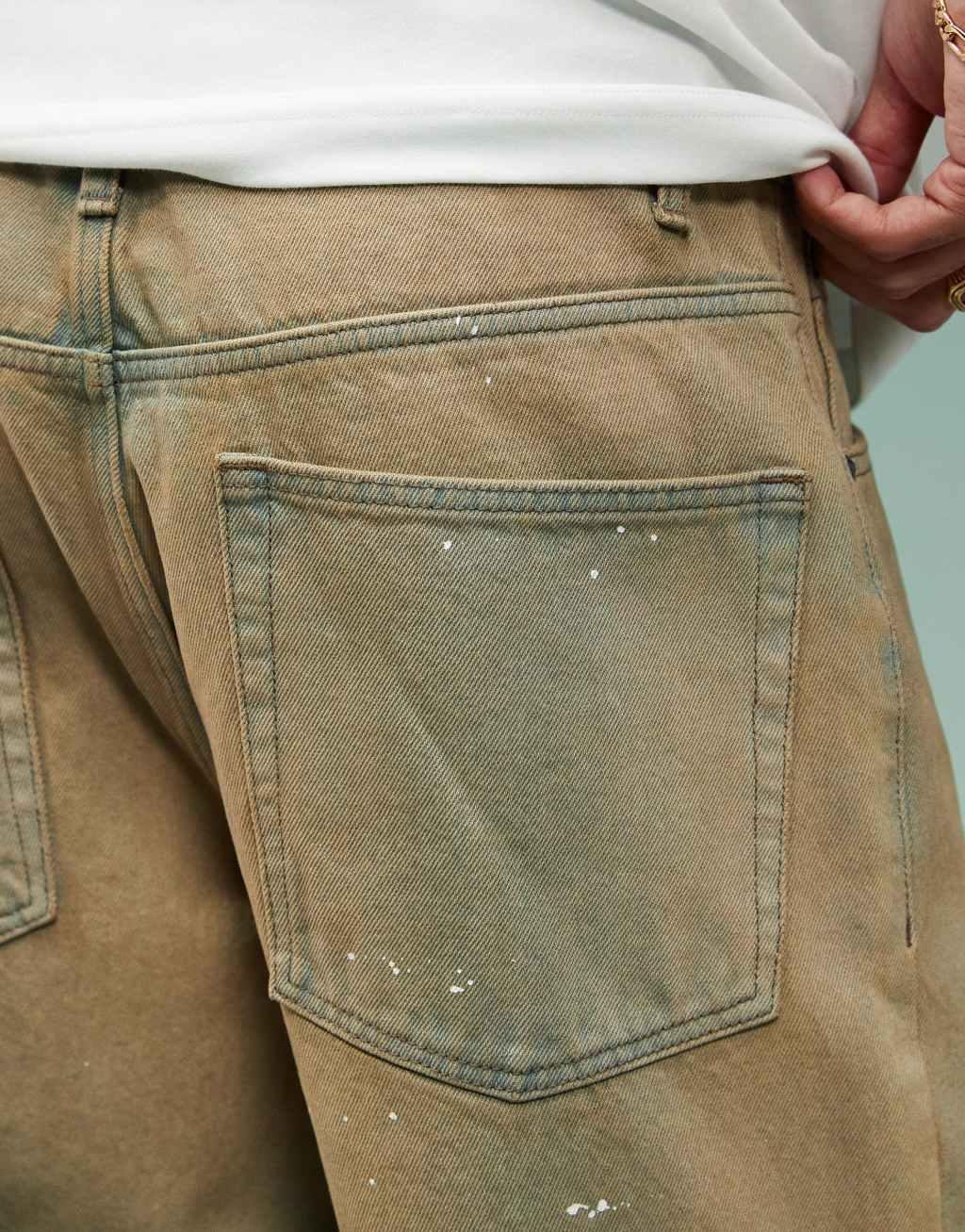 ASOS DESIGN baggy jeans with paint splatter in brown tint Product Image