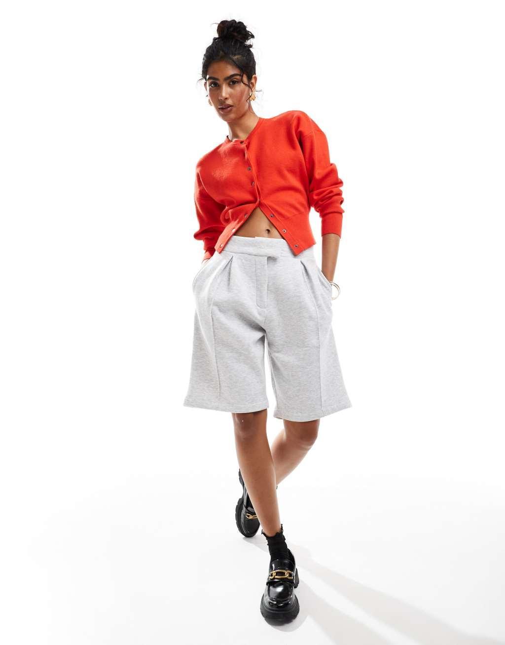 ASOS DESIGN crew neck cardigan with rib hem detail in red Product Image
