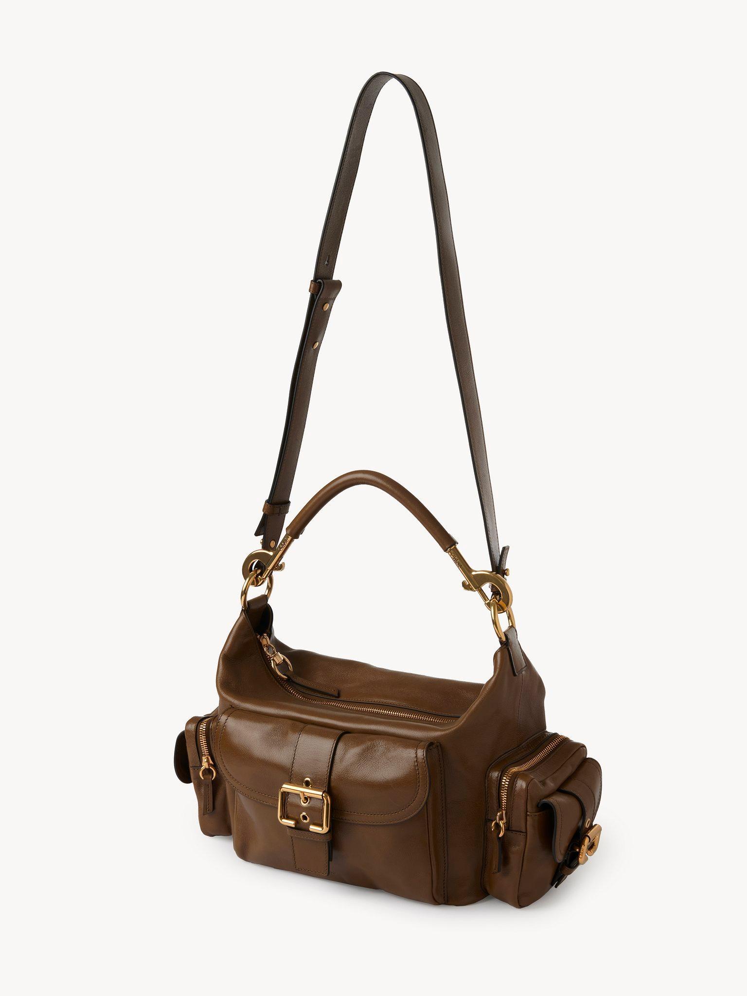 Camera bag in shiny leather Product Image
