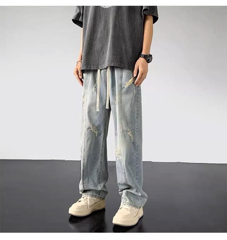 Drawstring Waist Washed Distressed Loose Fit Jeans Product Image