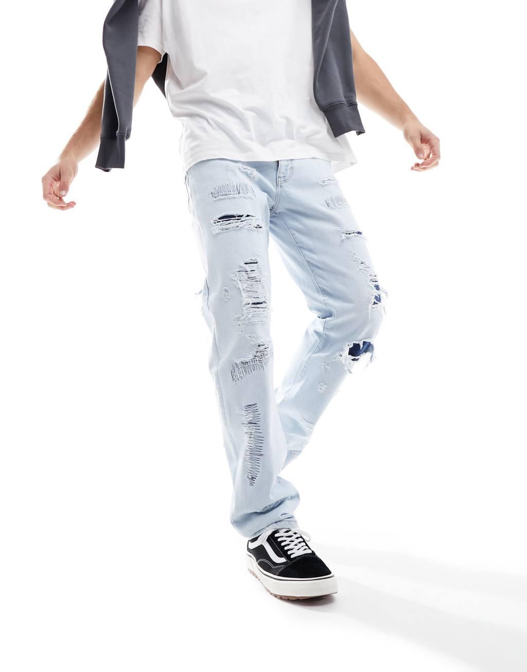 ASOS DESIGN straight leg jeans with rip repair detail Product Image