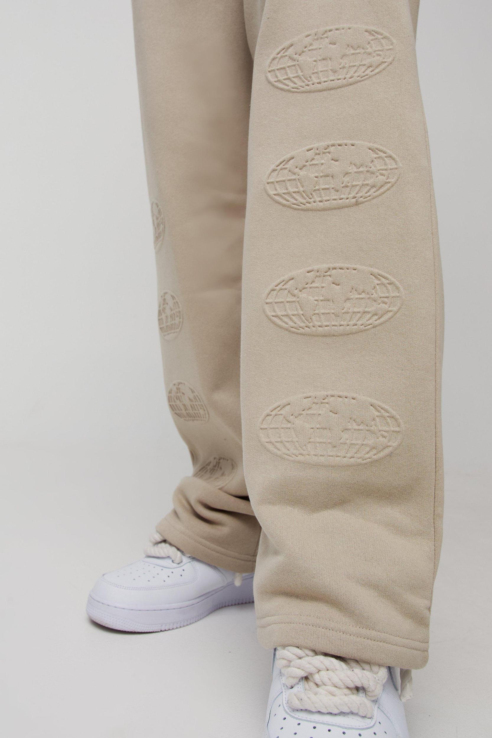 Tall Relaxed Worldwide Embossed Sweatpants | boohooMAN USA Product Image