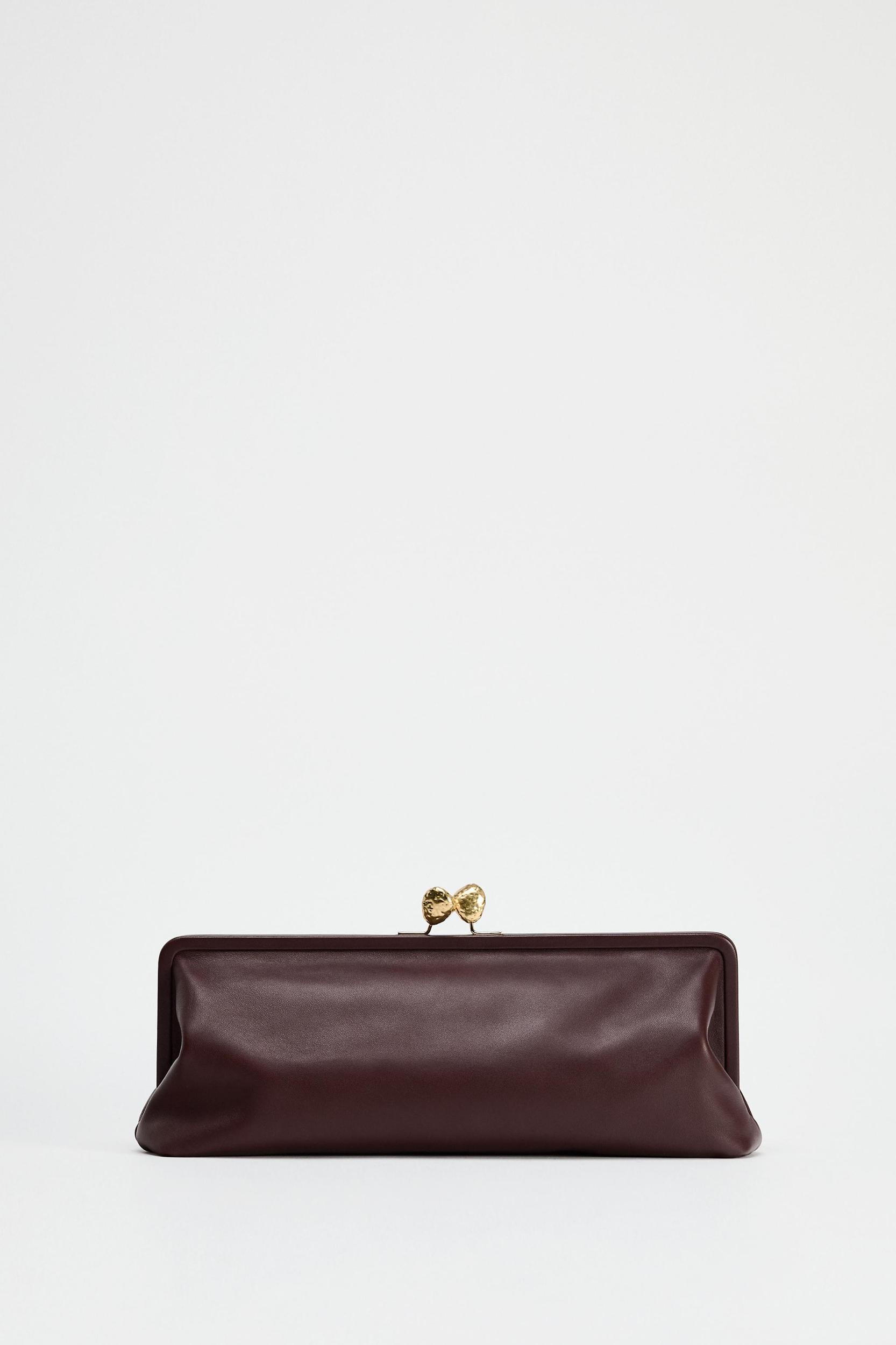 METAL TRIM LEATHER CLUTCH Product Image
