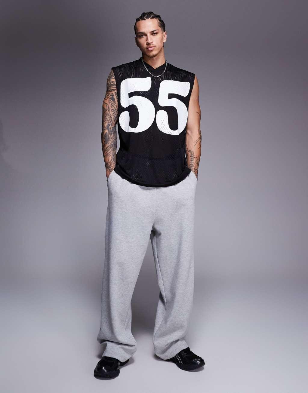 ASOS DESIGN oversized tank with sports graphic in black mesh Product Image