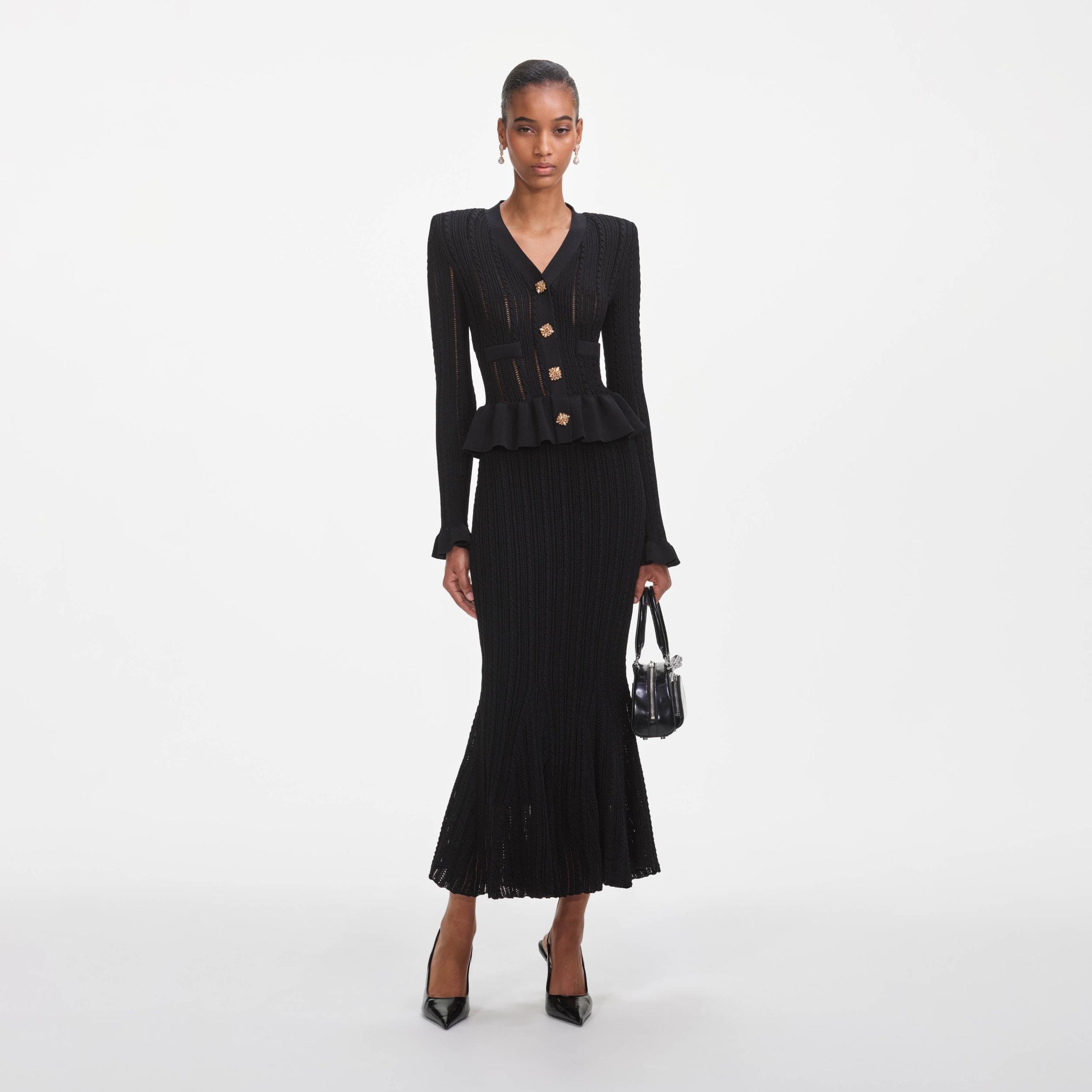 Black Knit Peplum Midi Dress Product Image