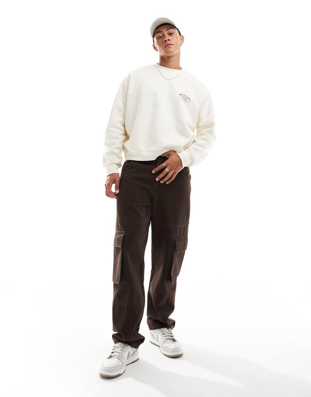 ASOS DESIGN boxy oversized dropped shoulder sweatshirt with chest print in cream Product Image