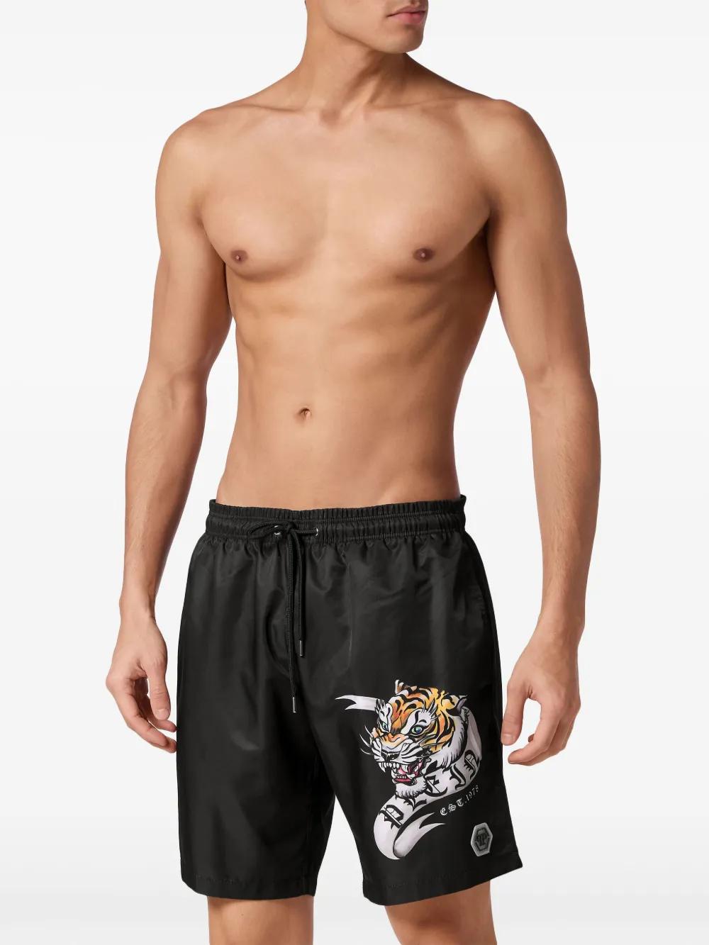 Tattoo-print drawstring swim shorts  Product Image