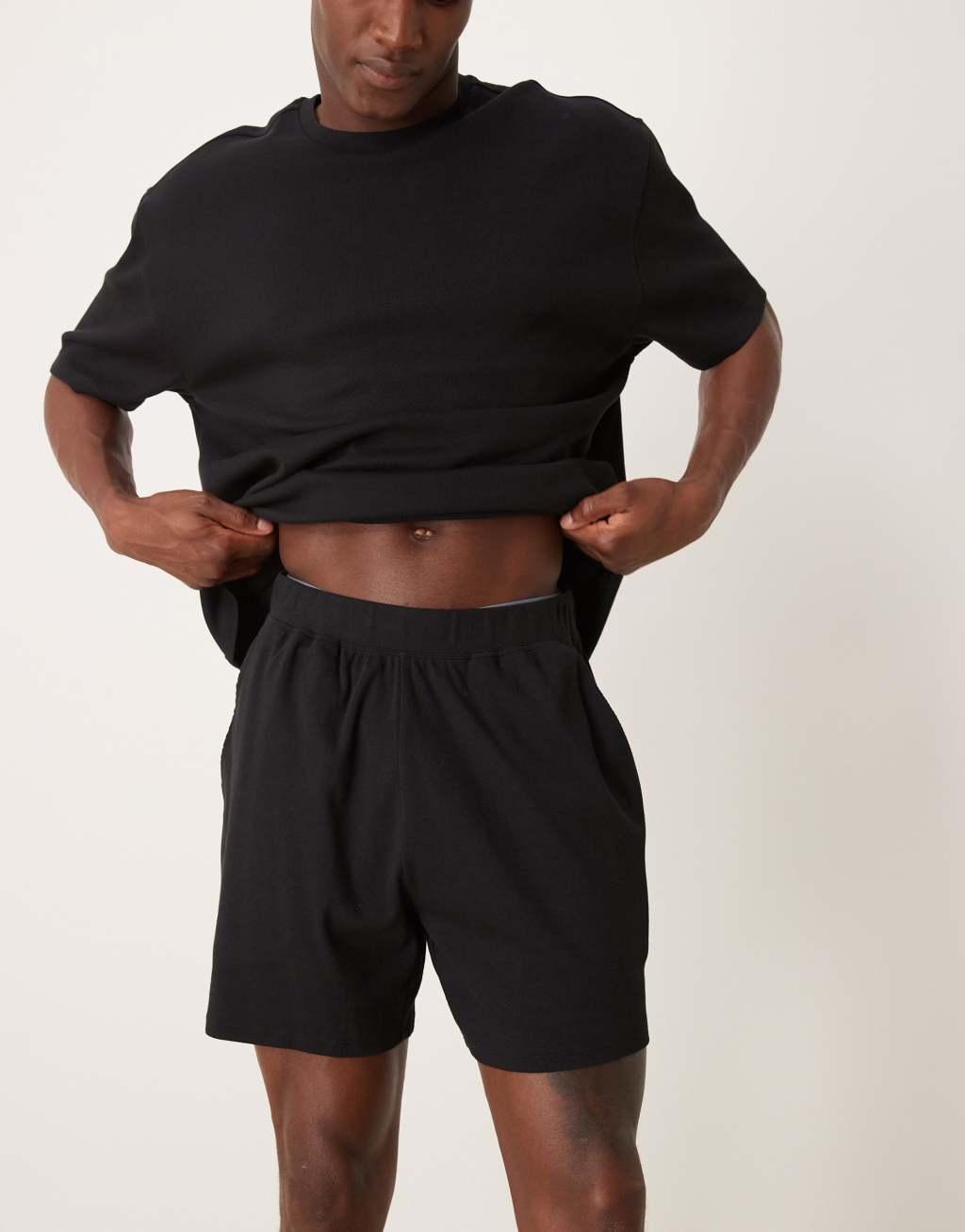 ASOS DESIGN capsule collection relaxed t-shirt and shorts lounge set in black Product Image