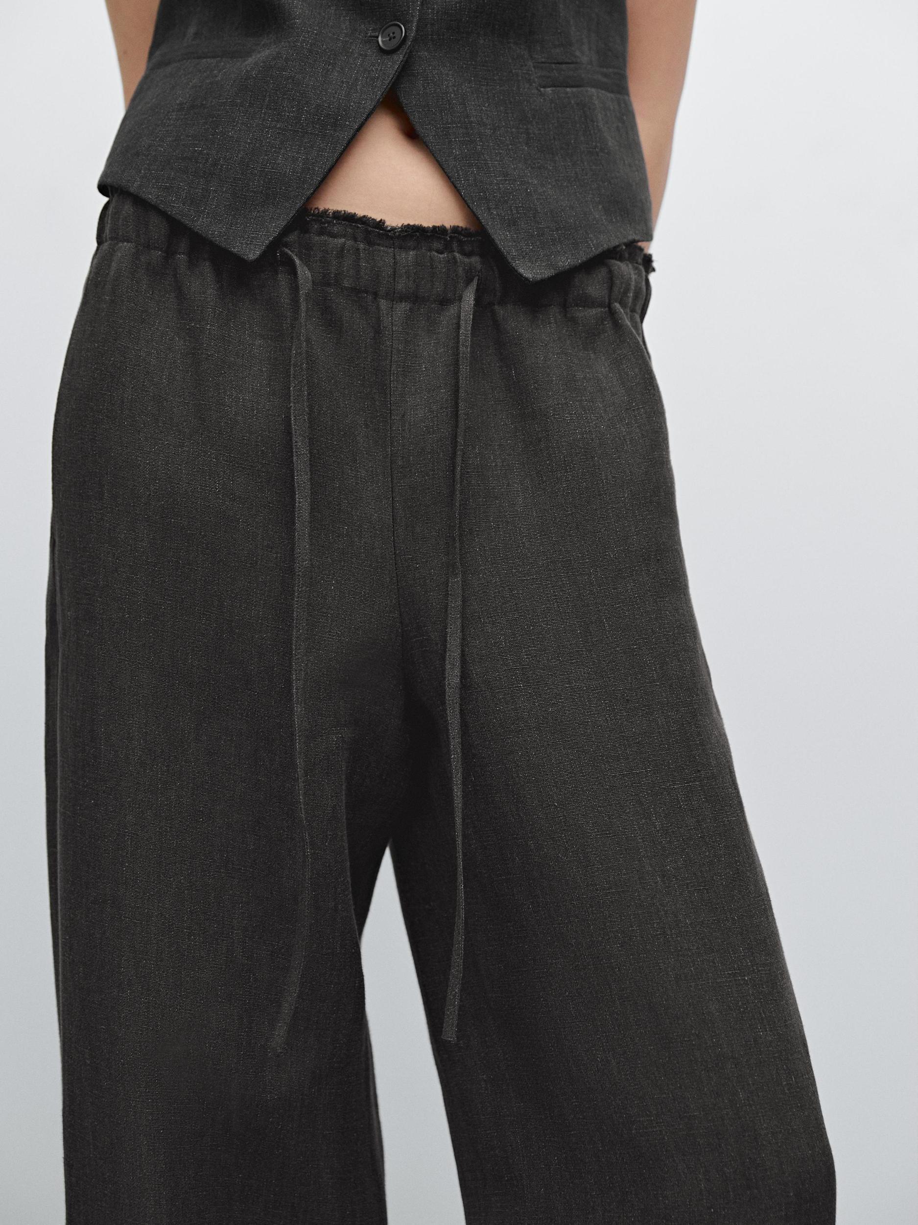 Linen suit trousers with frayed detail Product Image