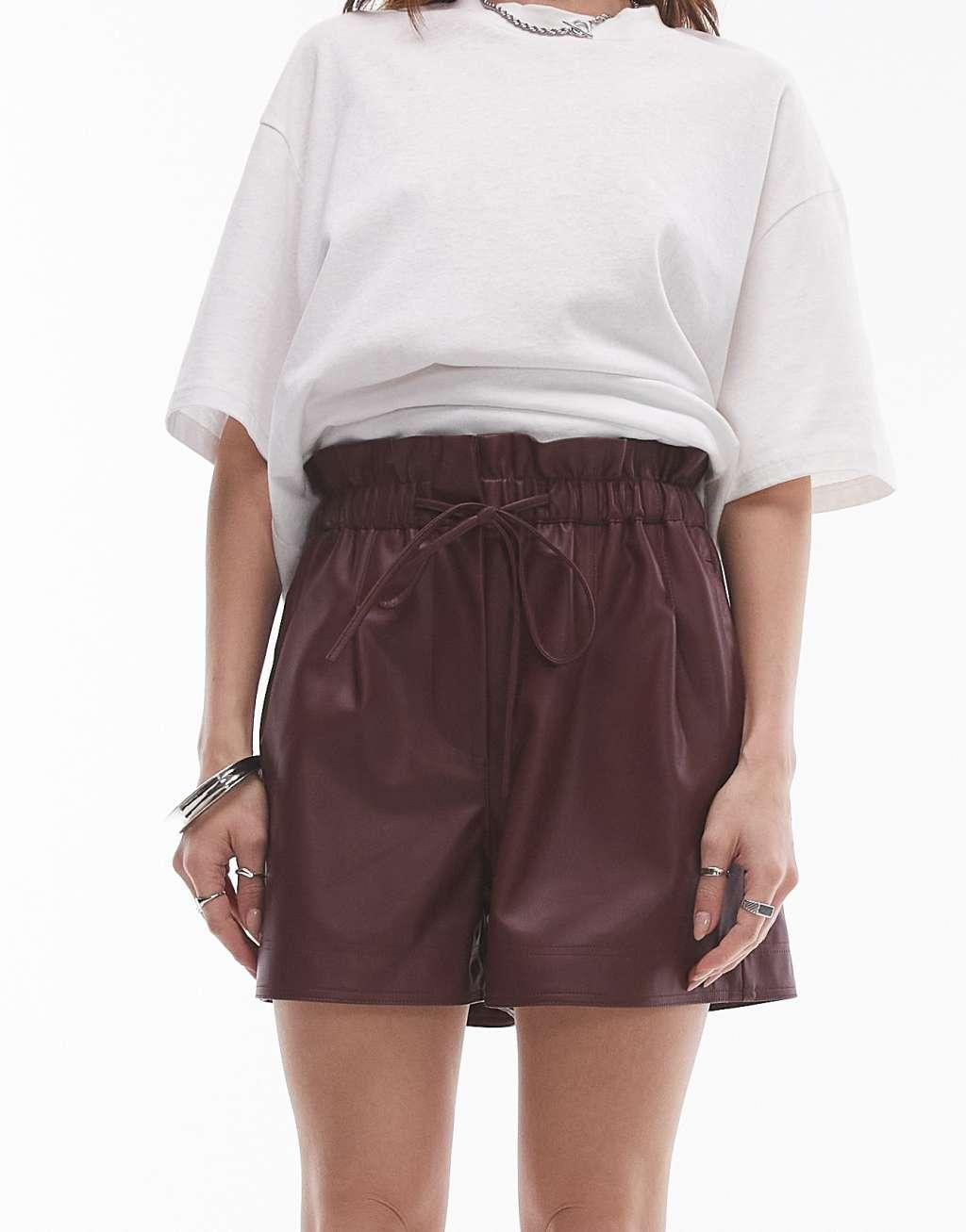 Topshop faux leather paperbag shorts in burgundy Product Image