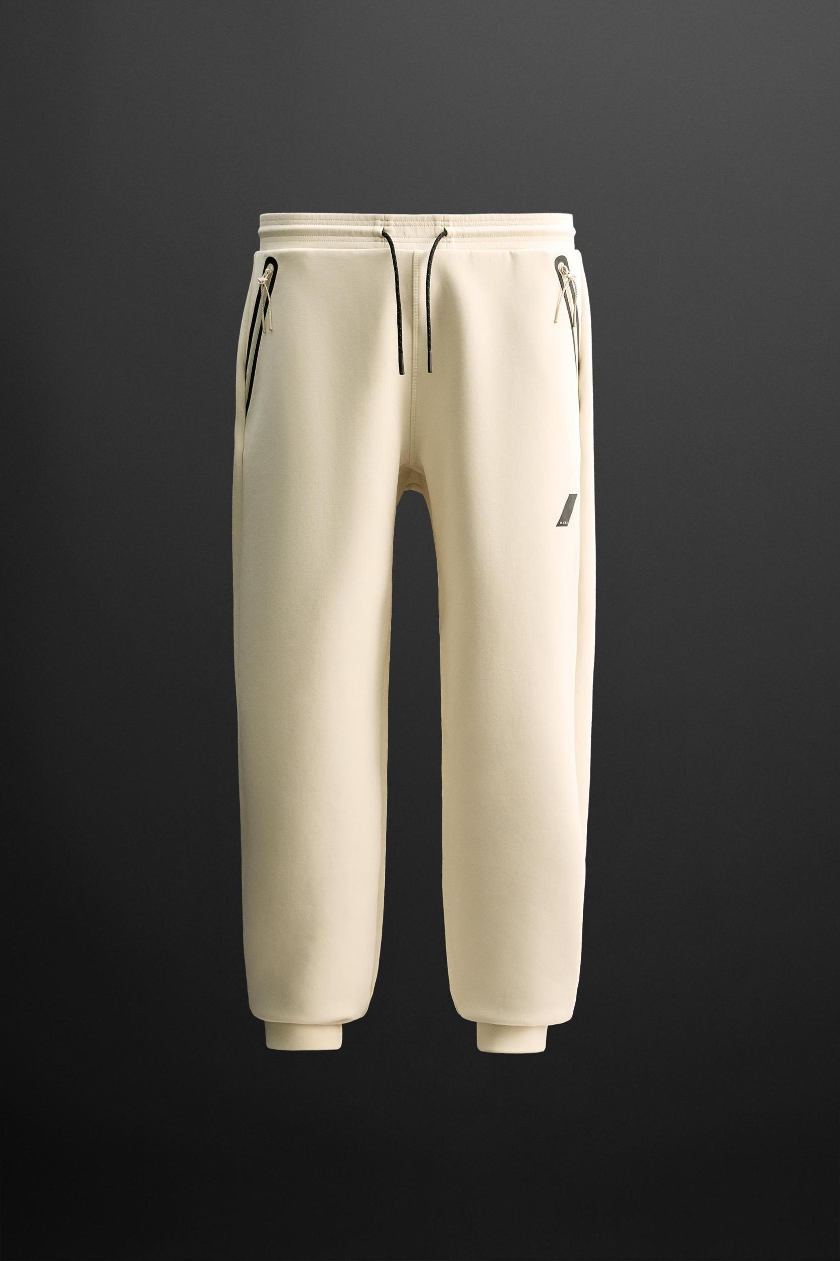 TECHNICAL ZIPPER JOGGER PANTS Product Image