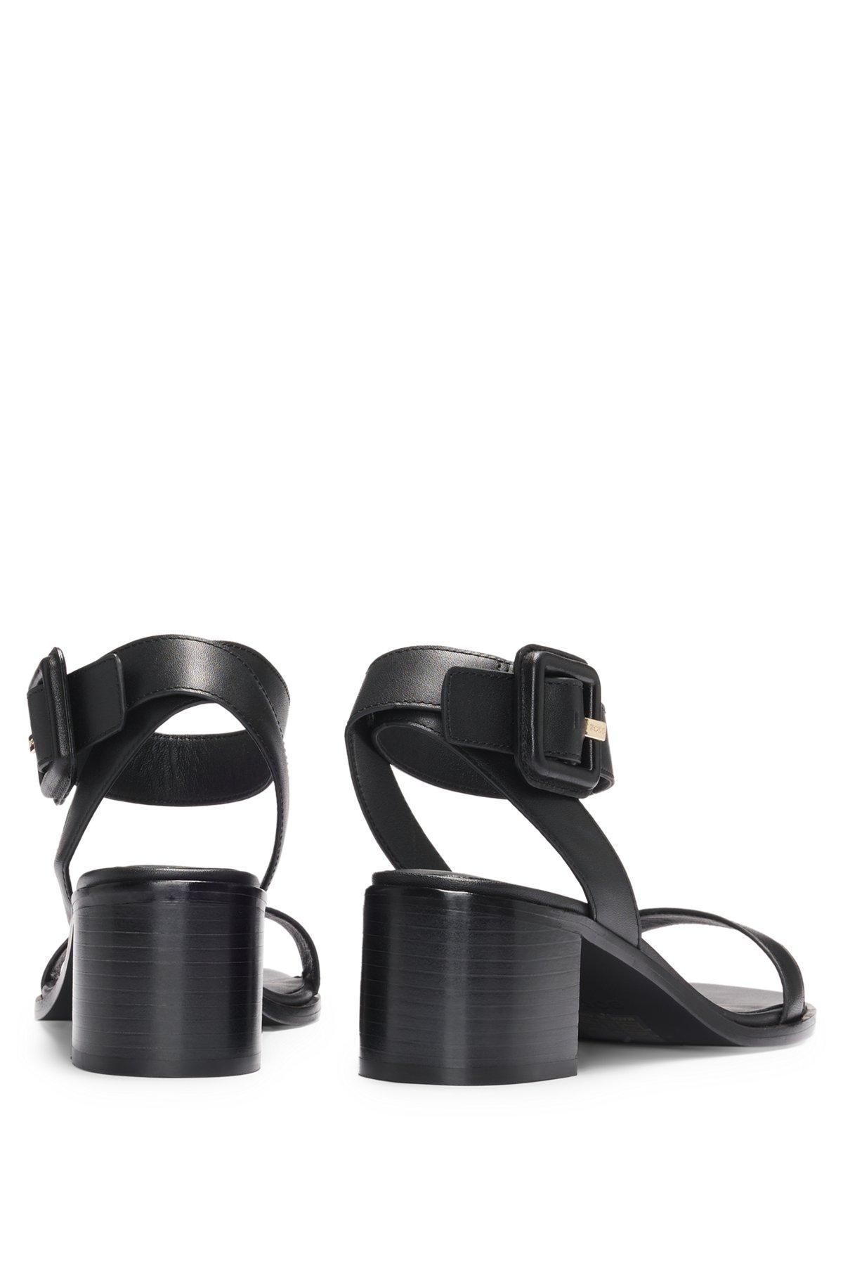 Leather sandals with block heel Product Image