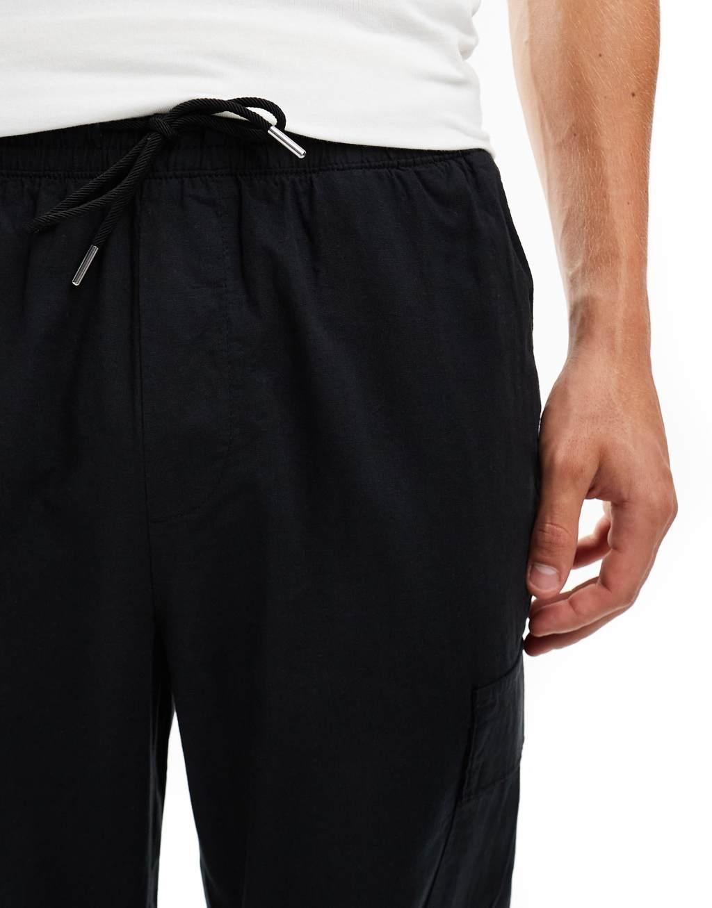Jack & Jones tapered linen blend pants with cargo pockets in black Product Image