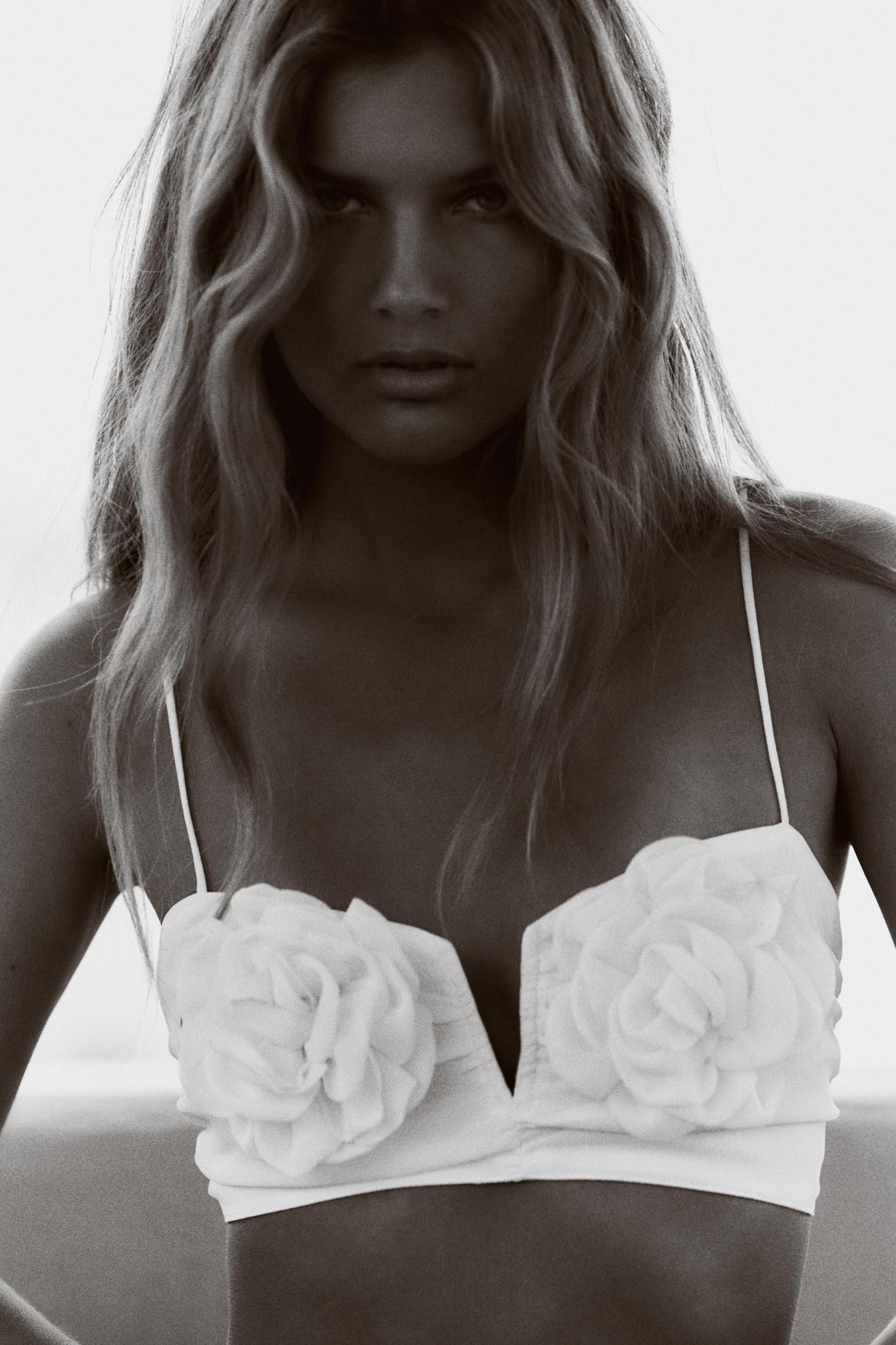 DRAPED TOP WITH TEXTURED FLOWERS Product Image