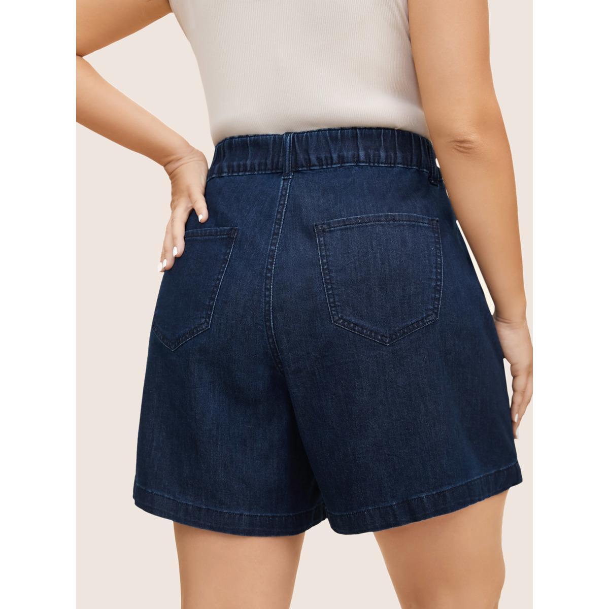 Plus Size Dark Wash Slanted Pocket Loose Denim Shorts Women Denimindigo Button Medium stretch Everyday Slanted pocket Casual Denim Shorts BloomChic 16/1X Product Image