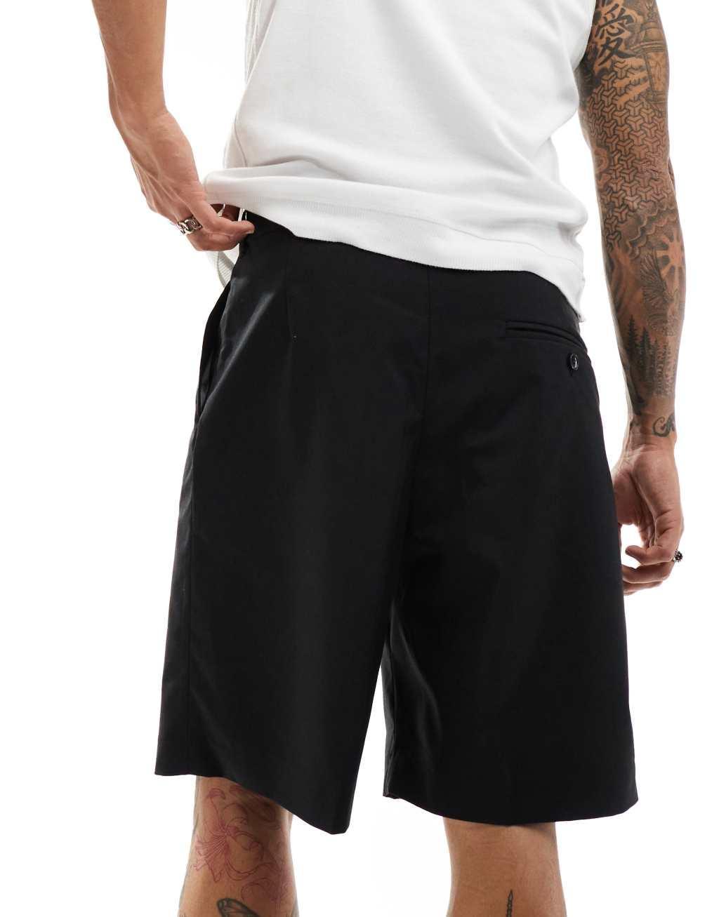 Weekday Uno loose fit tailored shorts in black Product Image