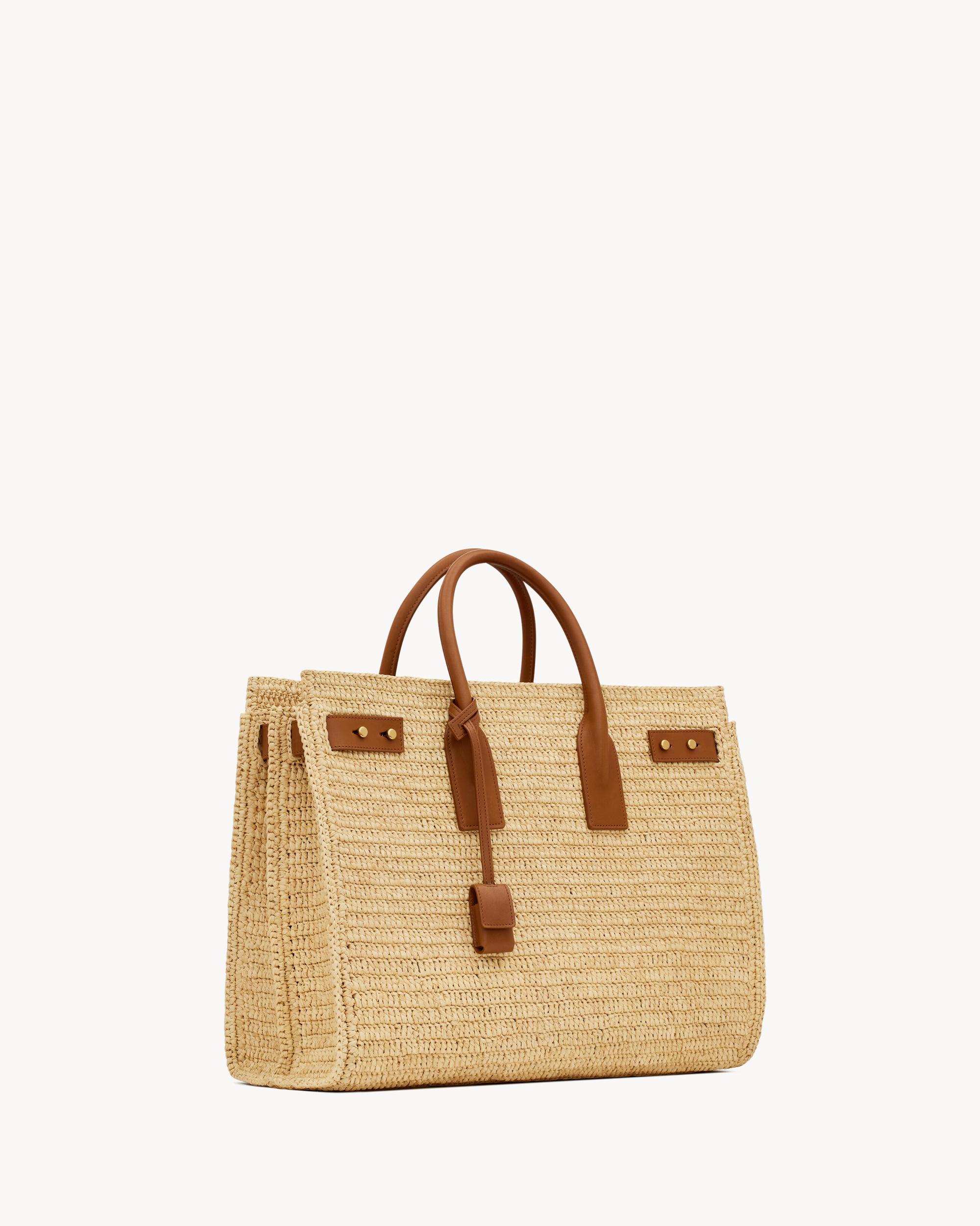 SAC DE JOUR supple in raffia and leather - MEDIUM Product Image
