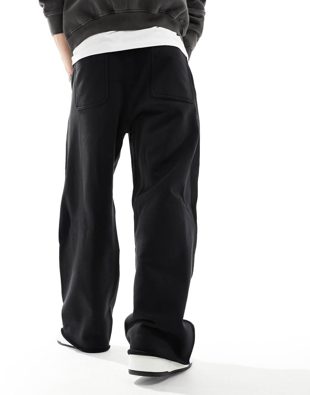 Weekday Astro loose fit sweatpants in black Product Image