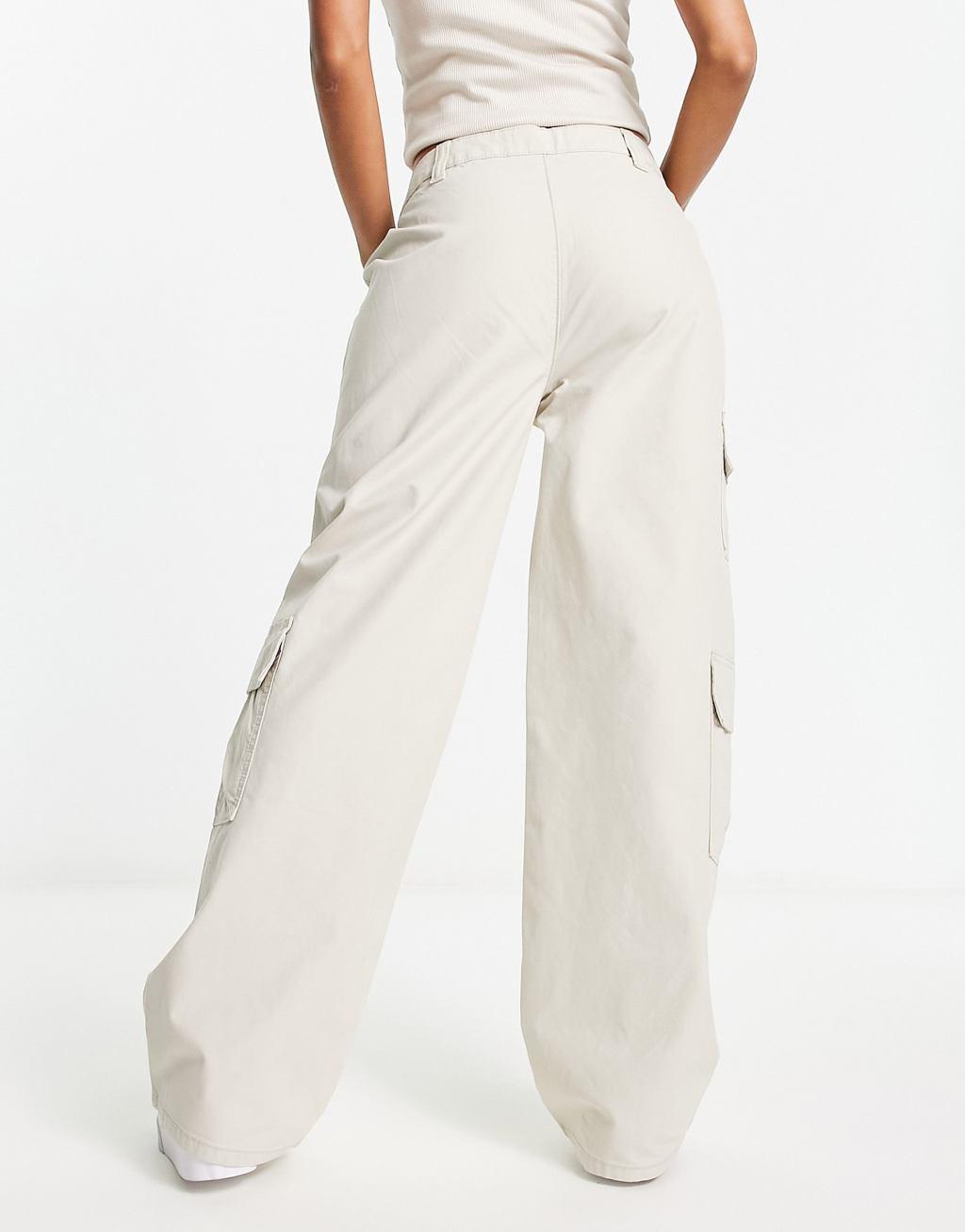 ASOS DESIGN oversized cargo pants with multi pocket in stone Product Image
