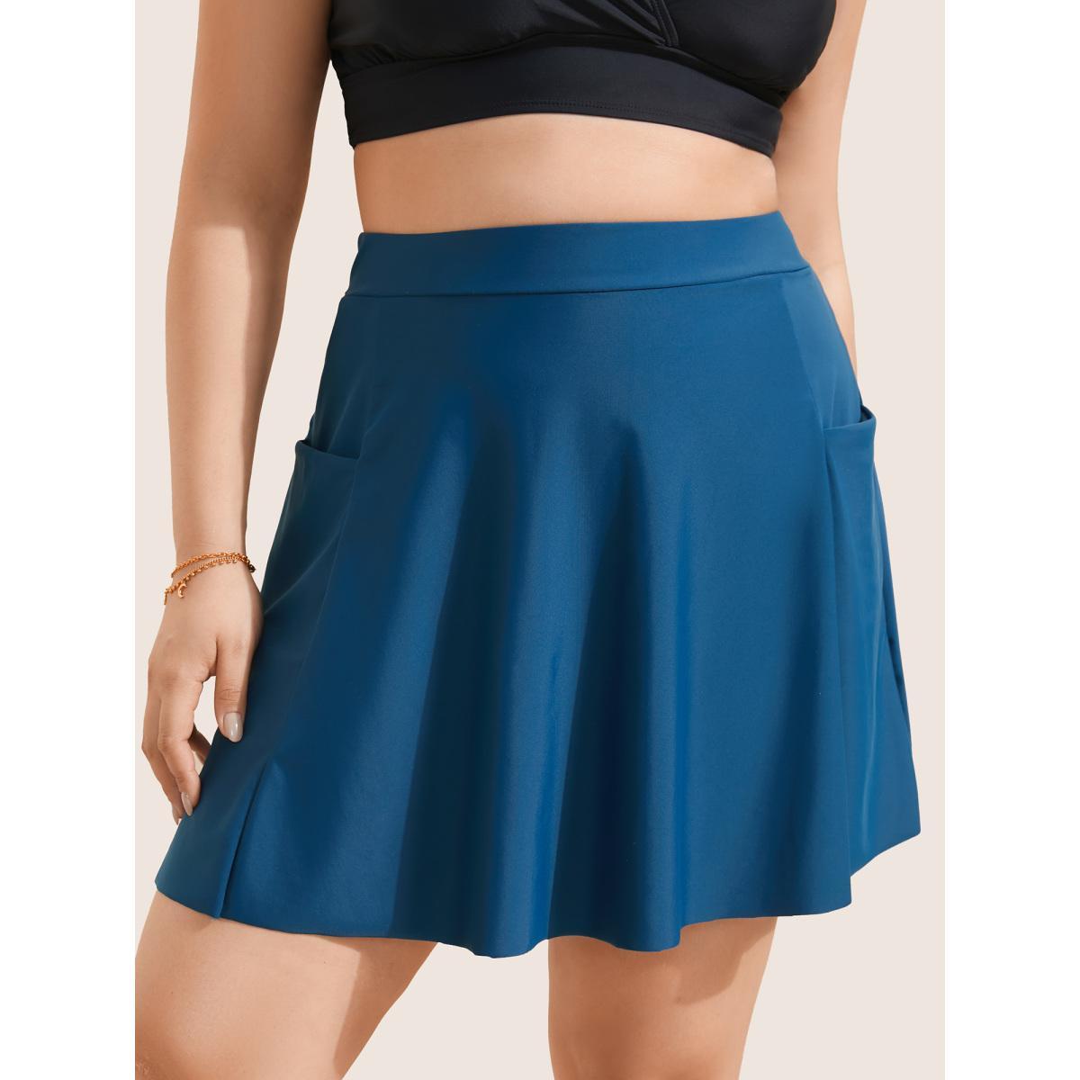 Plus Size Solid Patched Pocket Side Pleated Swim Skirt Women's Swimwear Indigo Beach Non High stretch Bodycon High Rise Slanted pocket Curve Swim Bottoms BloomChic 22-24/3X Product Image