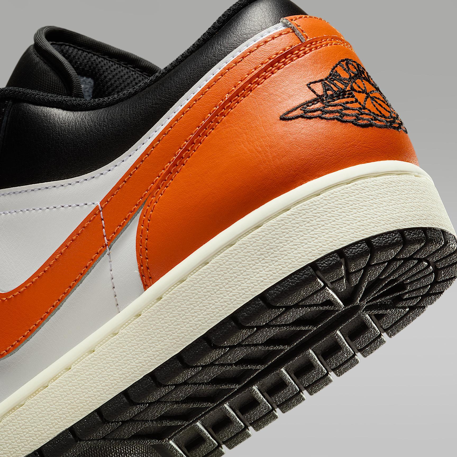 Jordan Mens Air Retro 1 Low Casual Shoes in Black/Starfish/White Product Image