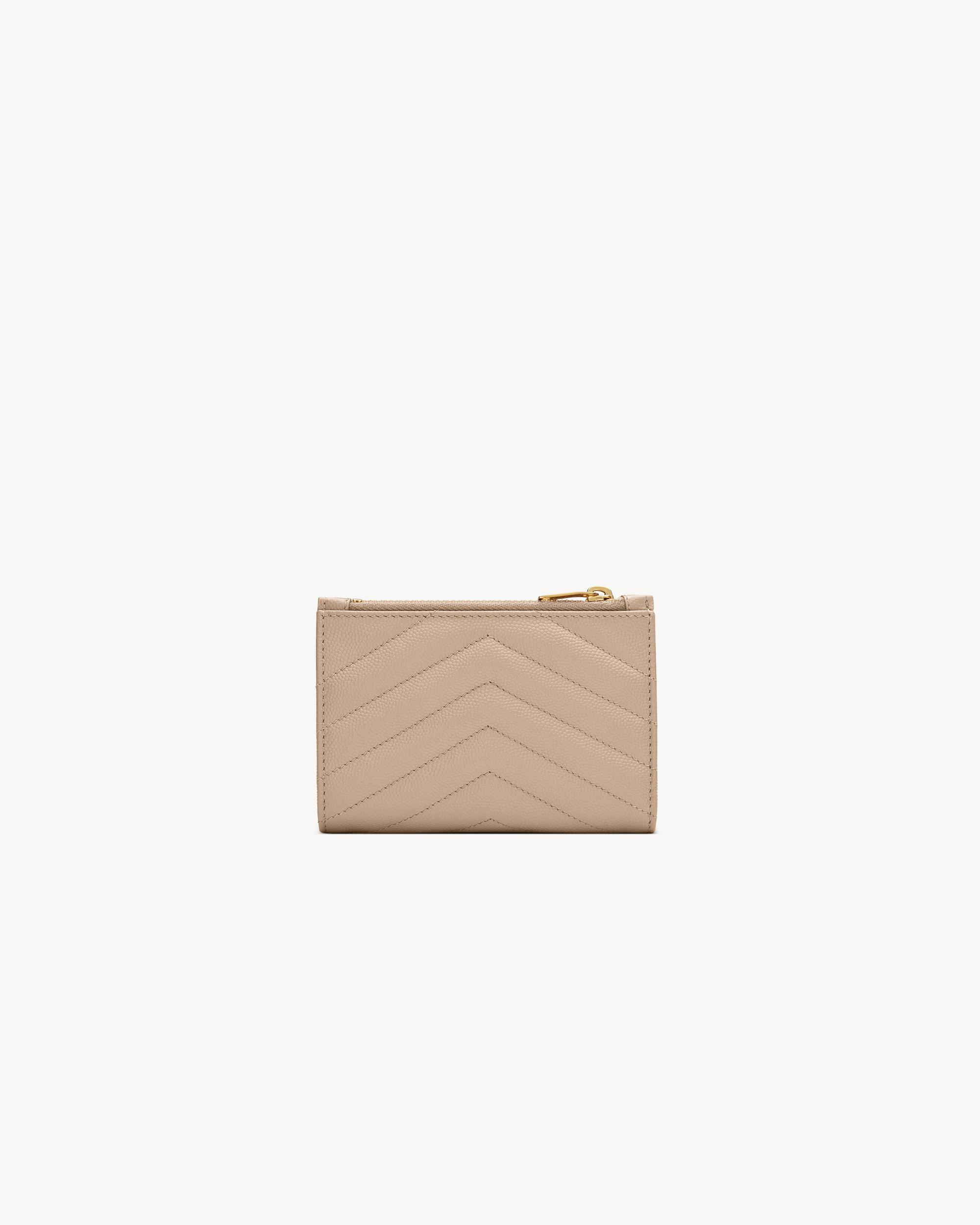 CASSANDRE MATELASSÉ Fragments bi-fold wallet in grain de poudre leather Product Image