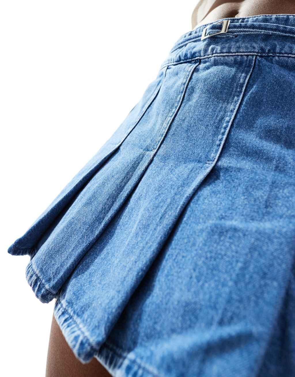 ASOS DESIGN denim pleated mini skirt with belt in midwash blue Product Image