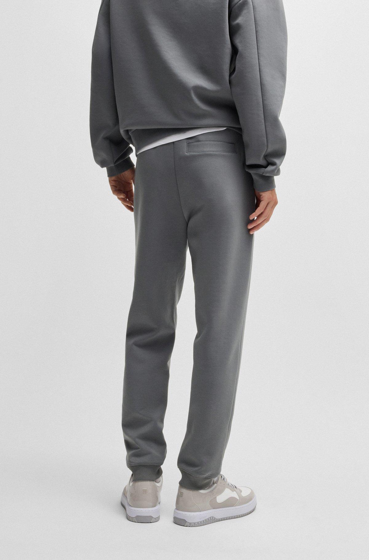 Cotton tracksuit bottoms with stacked logo Product Image