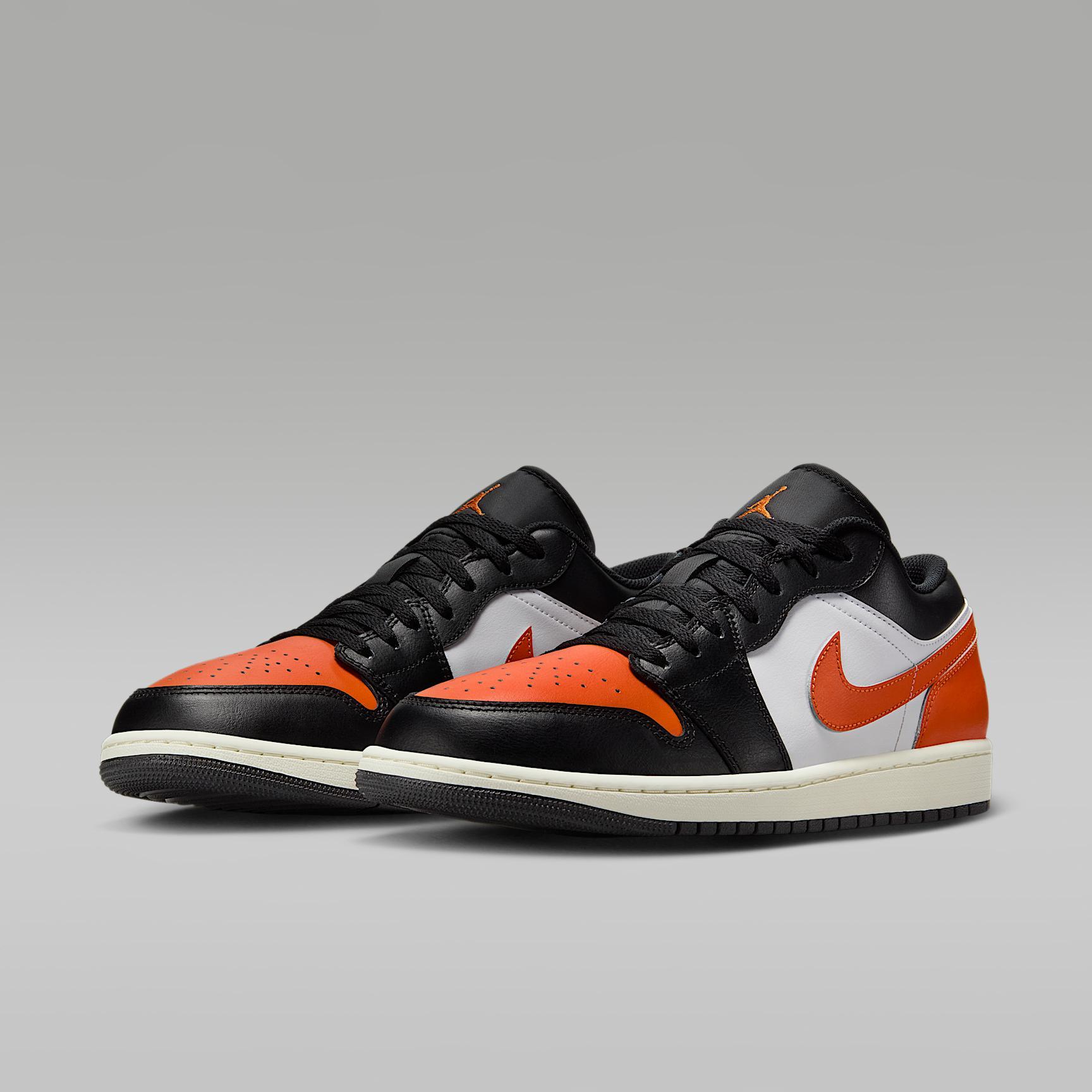 Jordan Mens Air Retro 1 Low Casual Shoes in Black/Starfish/White Product Image