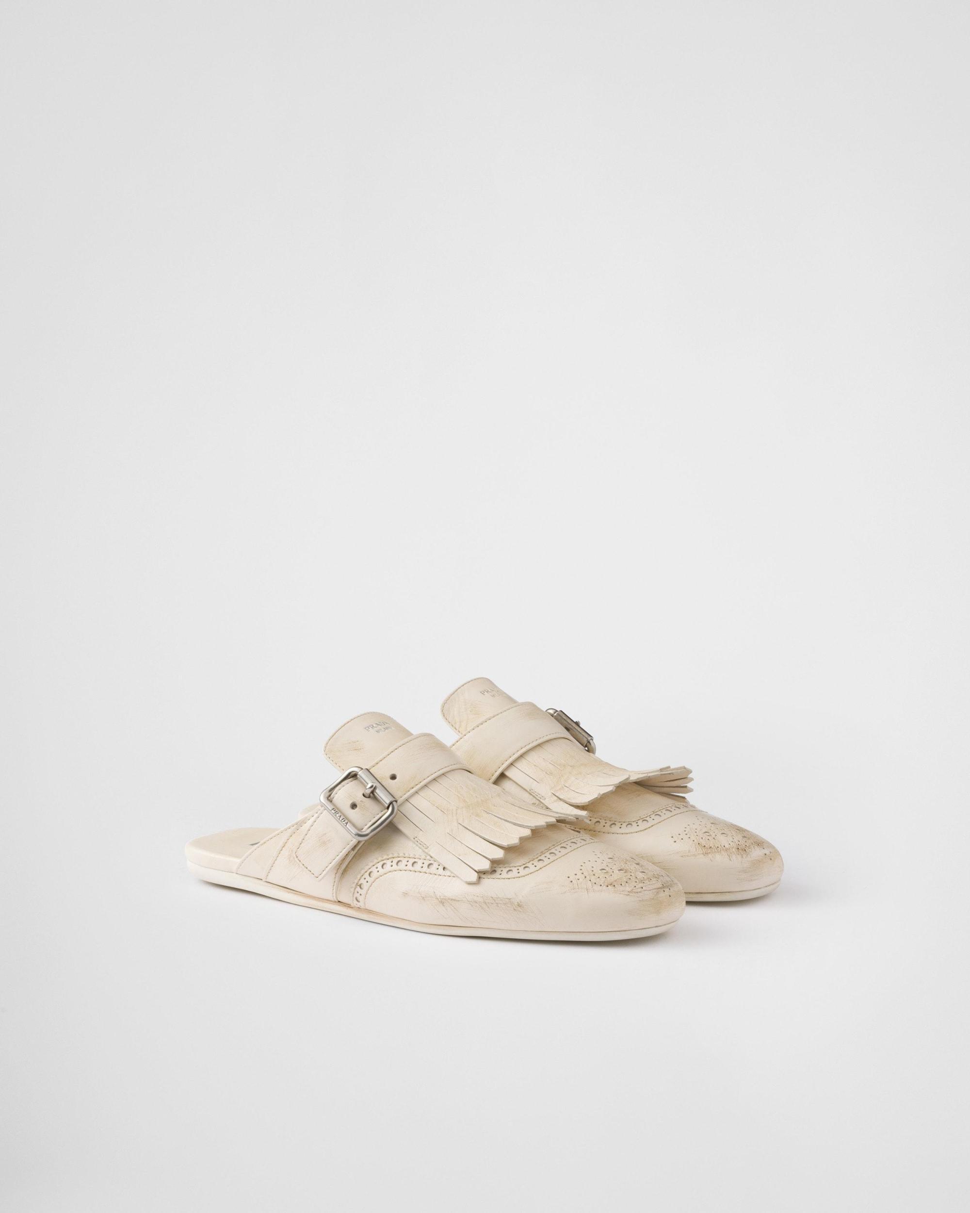 Shuffle fringed leather mules Product Image