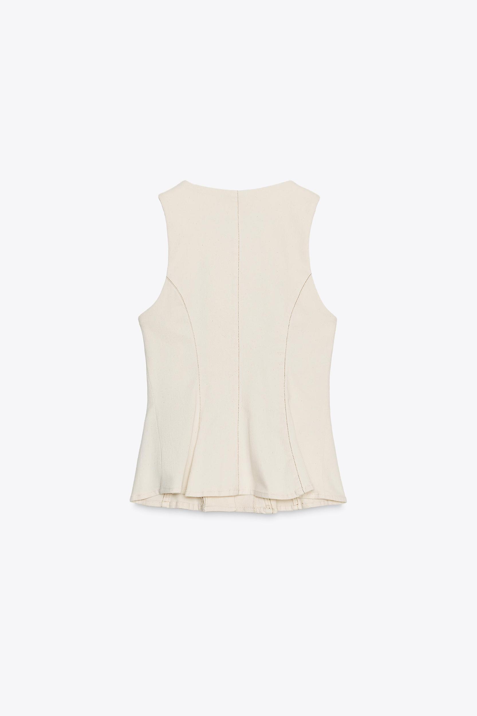 STITCHED PEPLUM VEST Product Image