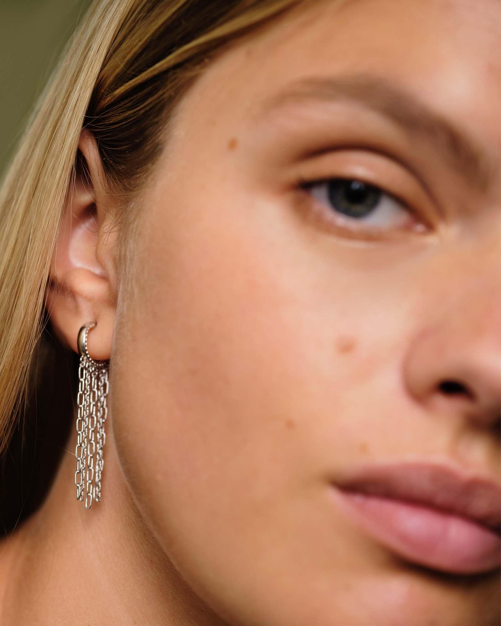 Eve Huggie Earrings in Silver Product Image