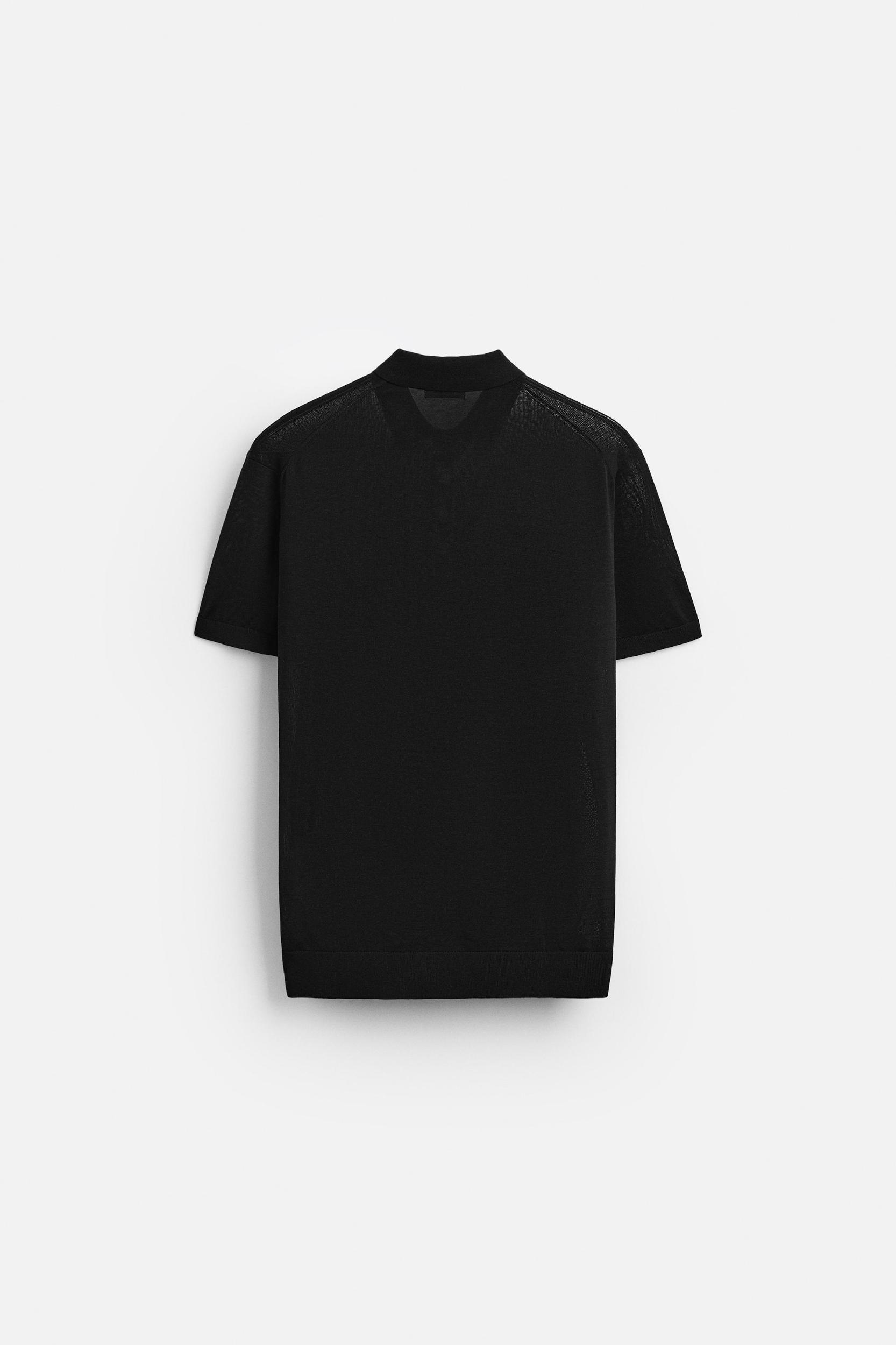 Cotton and silk blend polo shirt. Lapel collar with front button closure and short sleeves. Rib trim. Product Image