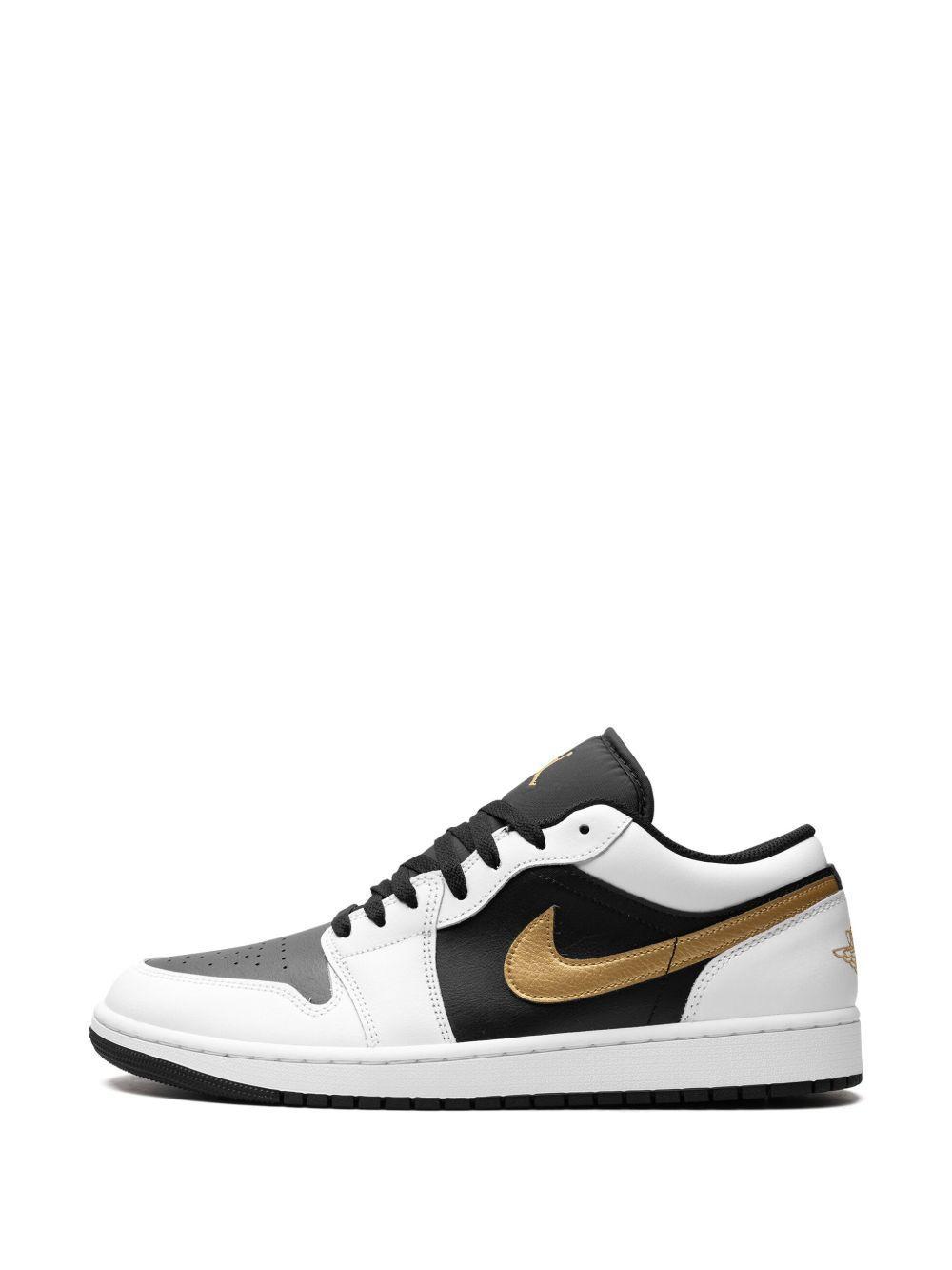 Air Jordan 1 Low "Gold Swoosh" sneakers  Product Image